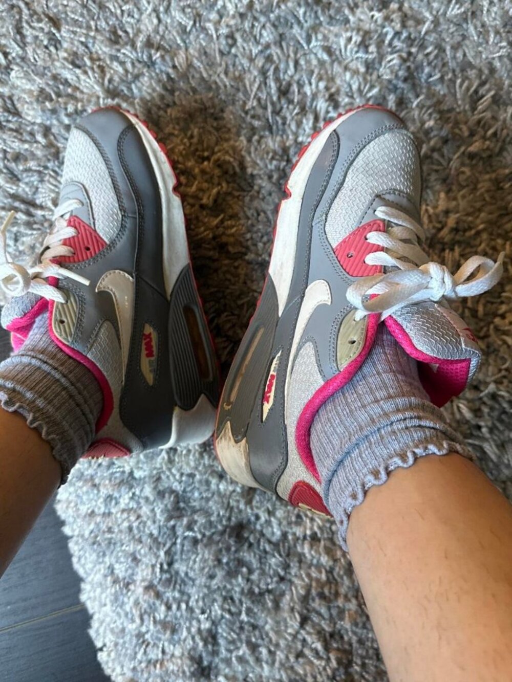 Worn Out Nike Air Max 90 sneakers in gray, pink, and white